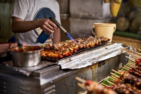 Street Vendor grilling Bangkok